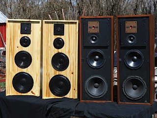 A pair of Genesis 3 speakers with HUMAN parts next to originals