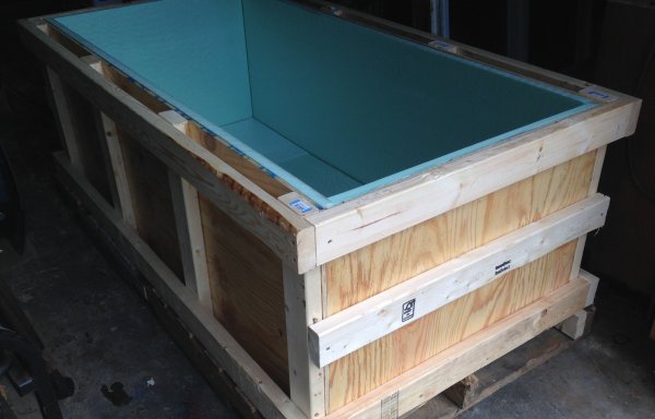 crate lined with plywood and rigid foam